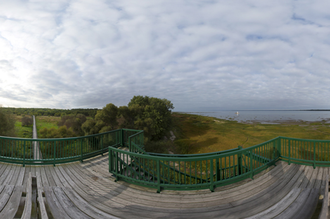 Panoramic photograph taken from the top of the tower in Anse du Port ecological park overlooking the St. Lawrence River and the walkway