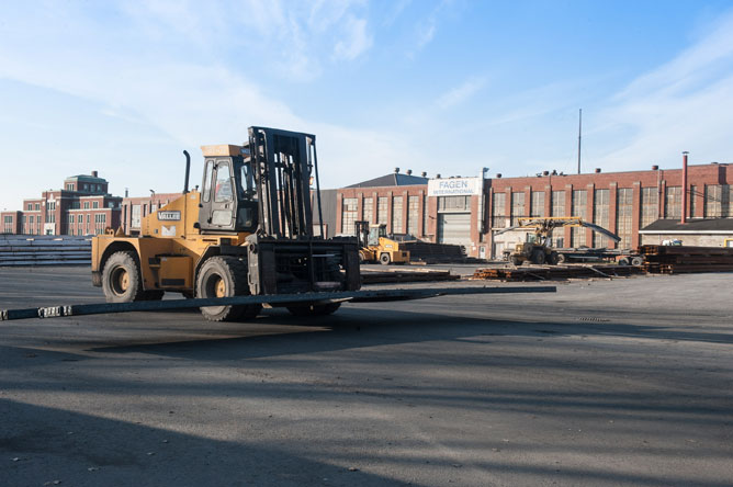 Lift trucks loaded with billets