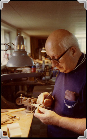 Philippe Demeules building a model in his workshop.