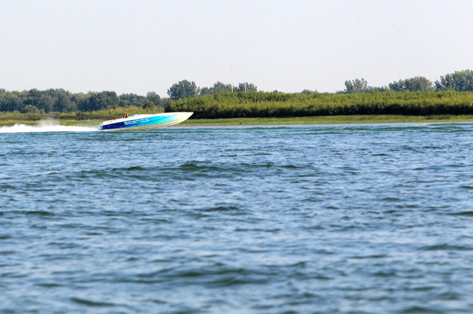 Pleasure boat speeding along the St. Lawrence