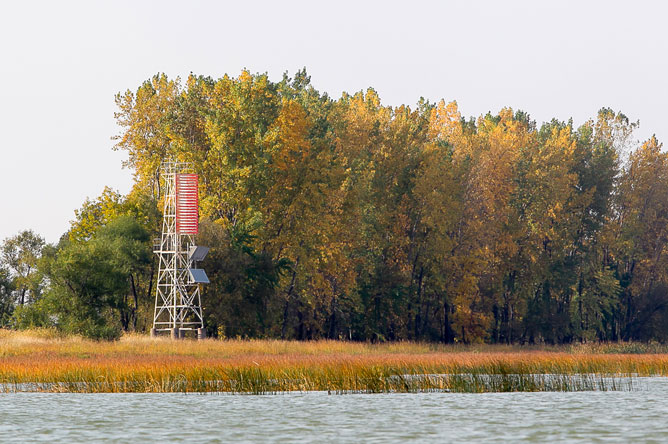 Range light with solar panels on an island in the archipelago 